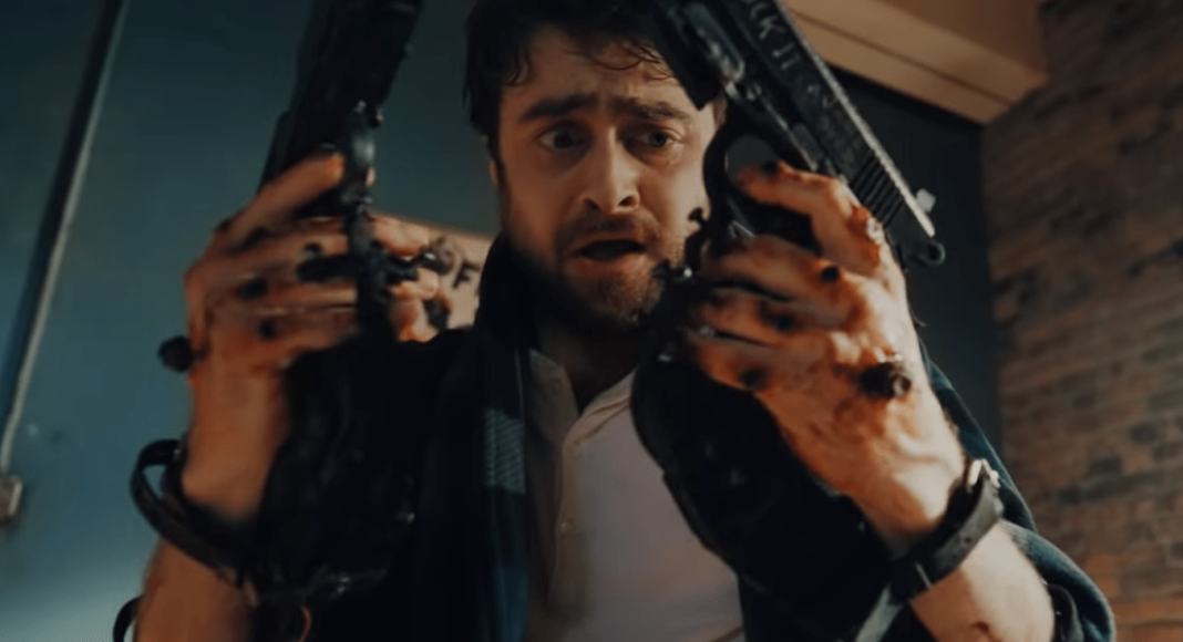 radcliffe-guns-akimbo