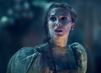 ‘Donzela’: Millie Bobby Brown escala uma parede de CRISTAIS na nova cena divulgada do filme; Confira!