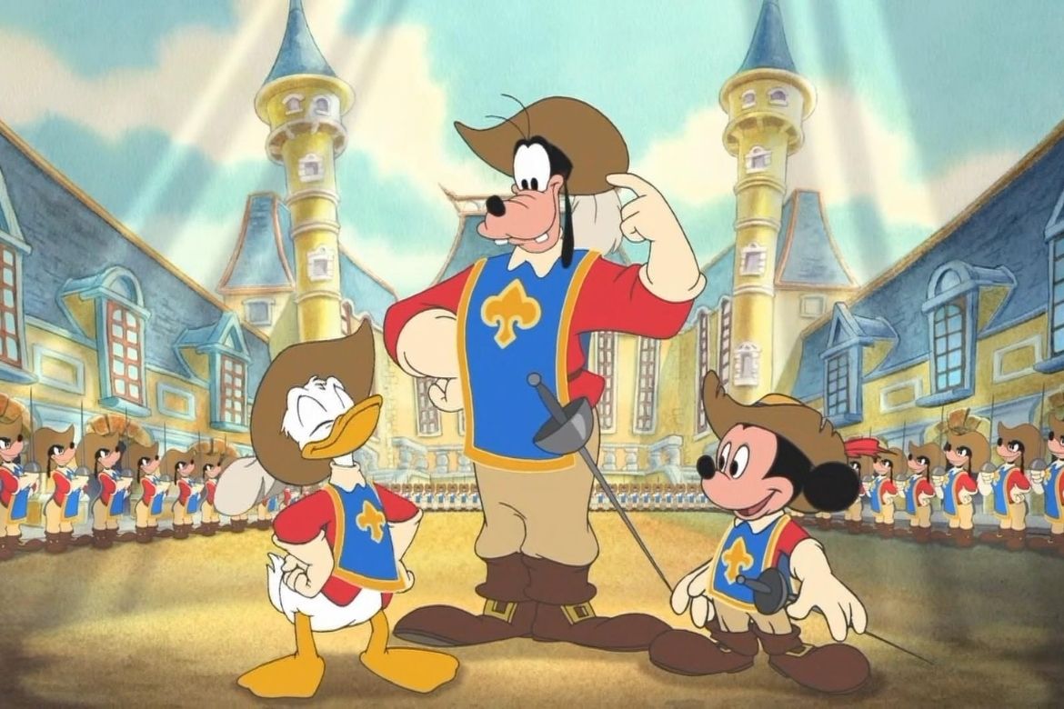 Personagens da Disney vestidos como mosqueteiros em castelo.