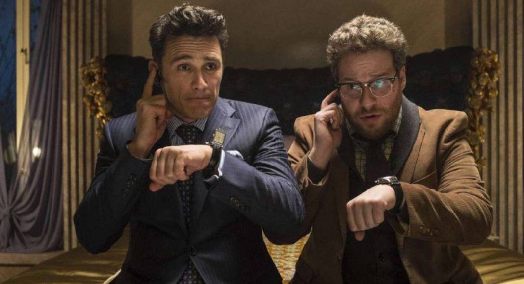 james franco seth (1) Dois homens sérios em traje formal, verificando relógios.