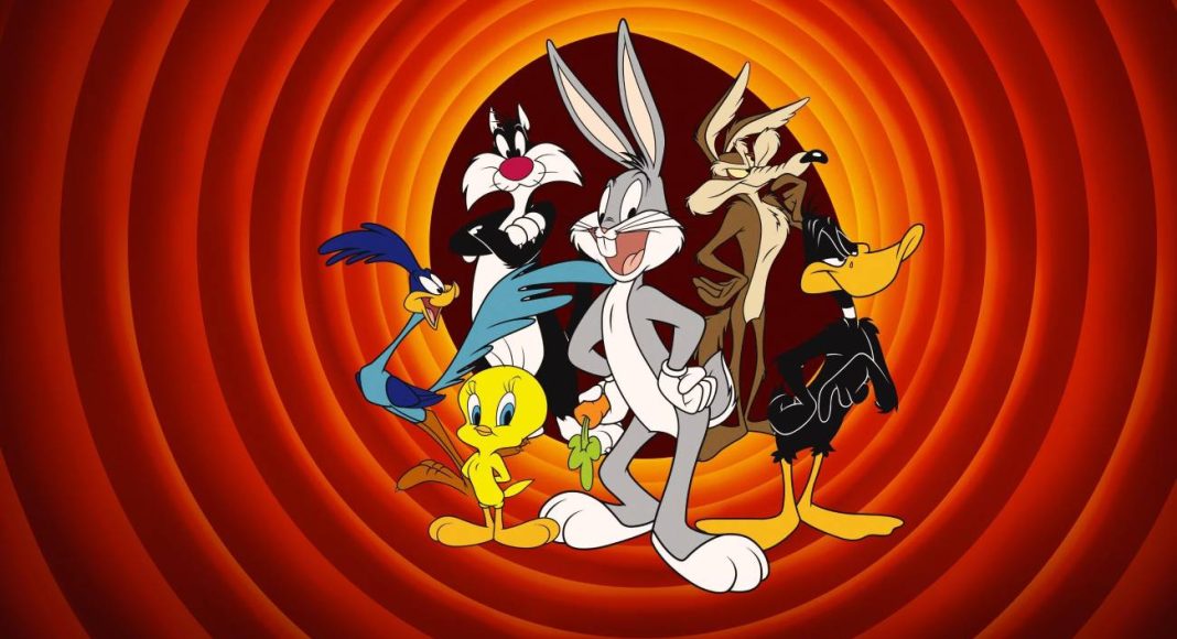 Personagens animados em fundo laranja espiral.