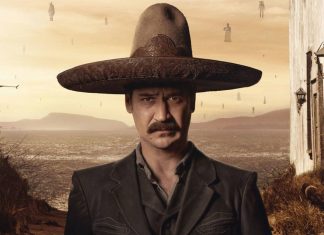 Homem com sombrero, deserto ao fundo.
