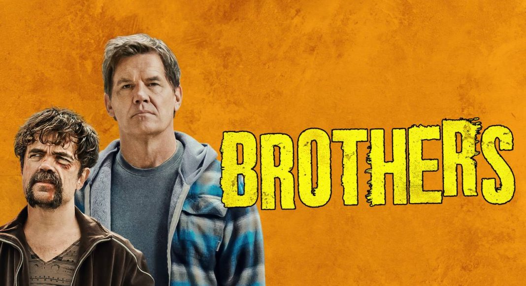 Dois homens em frente a fundo laranja, título 'Brothers'.