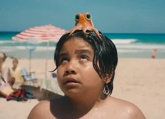 Taika Waititi nos leva aos bastidores de seu novo curta natalino, ‘O Menino e o Polvo’; Confira! boy with octopus on head