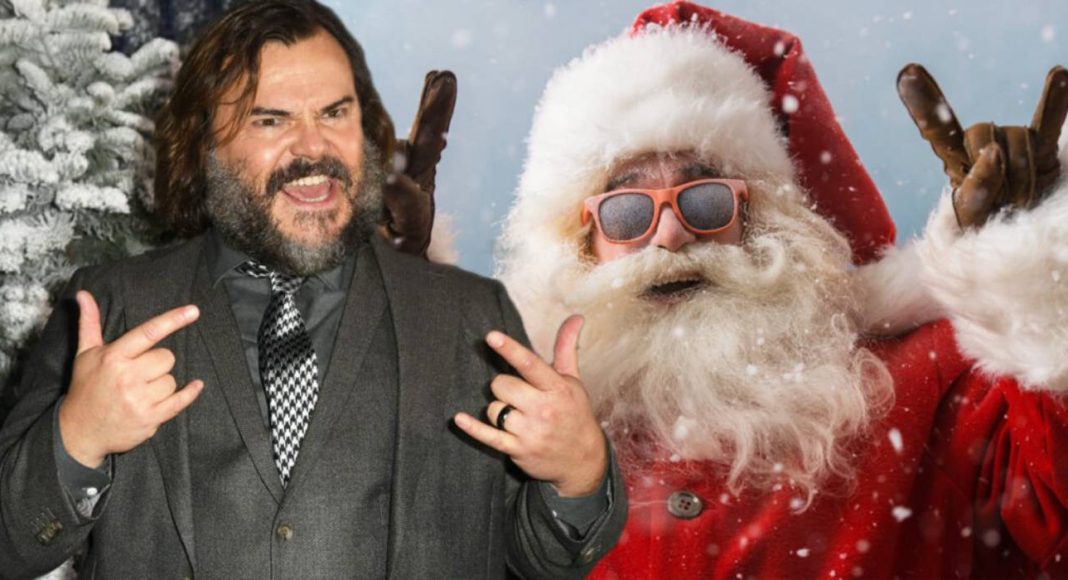 Homem e Papai Noel juntos em clima festivo.