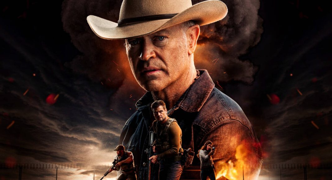 Cowboy e equipe armada em cenário de fogo