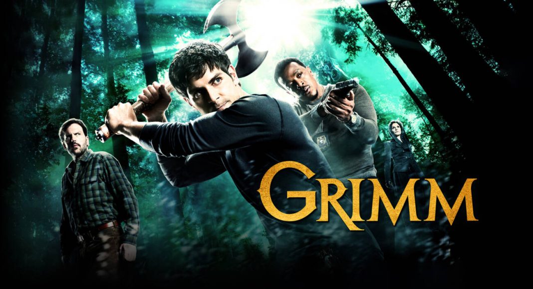 Personagens da série Grimm em floresta com armas