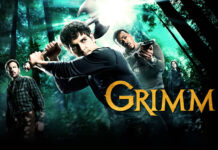 Personagens da série Grimm em floresta com armas