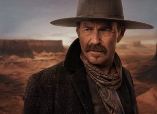 Homem de chapéu em paisagem desértica