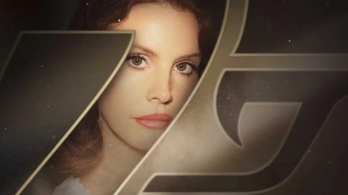 Close-up of a woman's face framed by large gold decorative letters.
