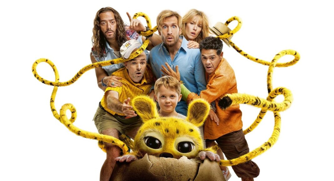 Child and several adults surround a yellow, big-eyed creature peeking from a cracked eggshell, tangled in yellow ropes, on a white background.