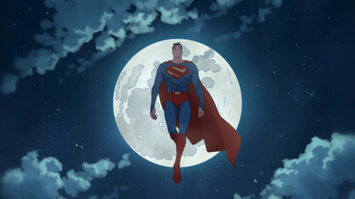 Superhero in blue suit with red cape flies in front of a full moon.