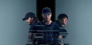 Three armed security personnel stand side by side in front of a dark doorway, with a digital glitch overlay across the foreground.