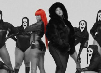 Lizzo e Sexyy Red lançam “HOES”, nova música original de ‘Todo Mundo em Pânico 6’; Ouça! Group of dancers in black outfits and white ghost masks pose with a central figure featuring bright red hair in a studio setting.