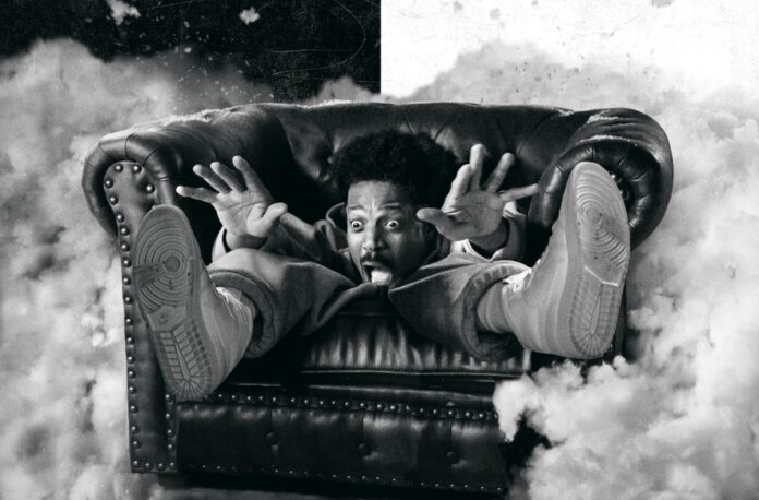 Promotional poster for a scary movie: man falls off a leather sofa with a shocked expression, bold 'SCARY MOVIE' title above in black-and-white.