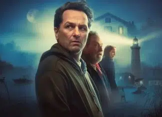 Four adults stand in a misty coastal town at night, with a lighthouse and moonlit sky in the background, suggesting a movie poster.